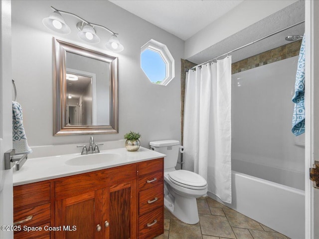 full bath with toilet, shower / bathtub combination with curtain, and vanity