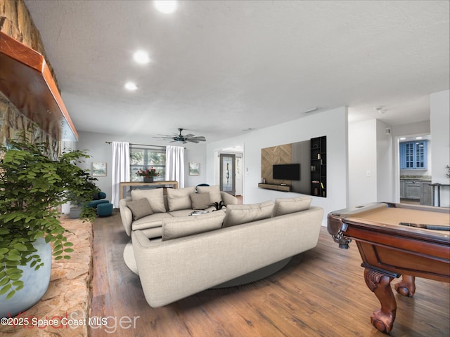 living area with pool table, a ceiling fan, wood finished floors, and visible vents