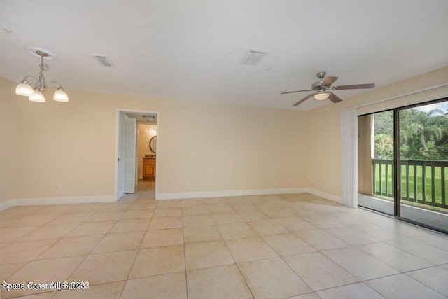 7667 N Wickham Rd Unit 903, Melbourne, FL 32940 - unfurnished room featuring ceiling fan, a chandelier, and light tile patterned flooring