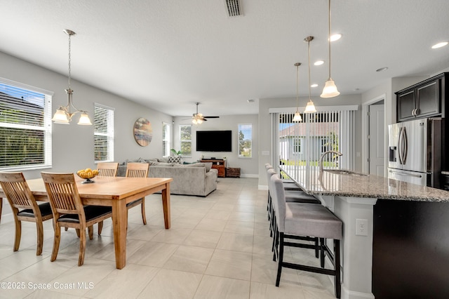 dining area with visible vents, recessed lighting, baseboards, and a ceiling fan