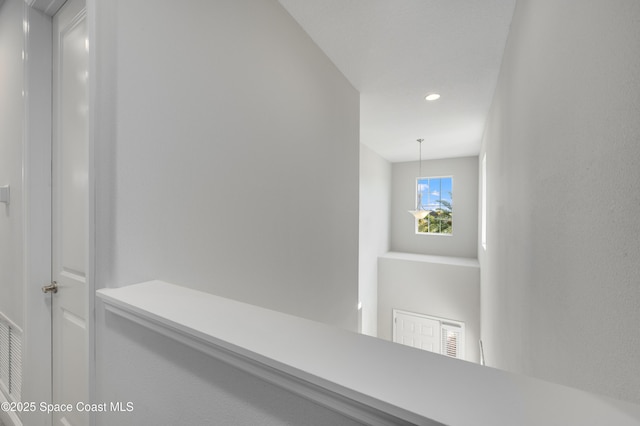 hallway featuring recessed lighting