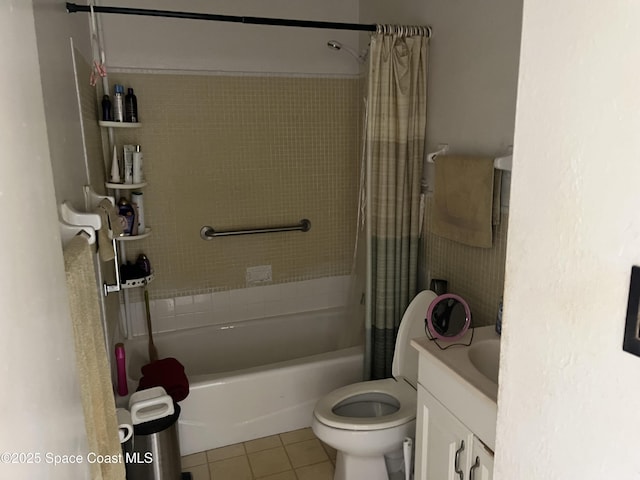 full bathroom with tile patterned floors, shower / bathtub combination with curtain, vanity, and toilet
