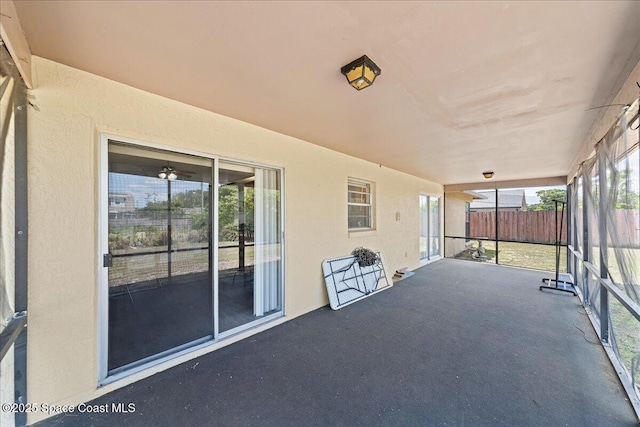 unfurnished sunroom featuring a healthy amount of sunlight