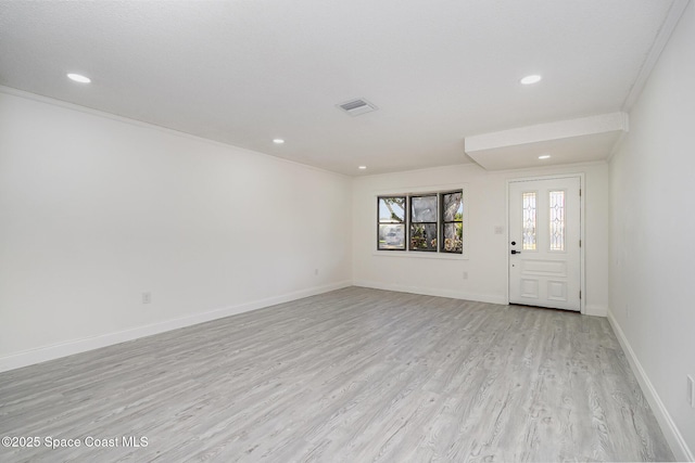 entryway featuring visible vents, recessed lighting, light wood finished floors, and baseboards