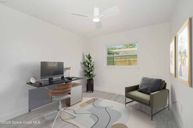 906 Kings Post Rd, Rockledge, FL 32955 - office space featuring light wood-style flooring, plenty of natural light, and baseboards