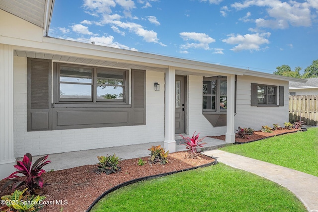906 Kings Post Rd, Rockledge, FL 32955 - single story home with brick siding and a porch