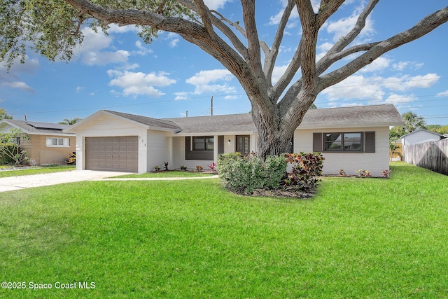906 Kings Post Rd, Rockledge, FL 32955 - single story home with driveway, an attached garage, brick siding, and a shingled roof