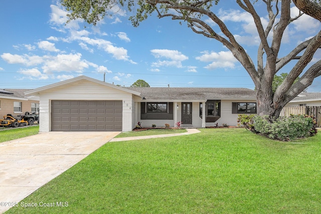 906 Kings Post Rd, Rockledge, FL 32955 - single story home with a garage, driveway, brick siding, and a shingled roof
