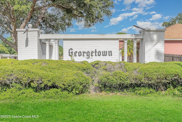 906 Kings Post Rd, Rockledge, FL 32955 - community sign featuring a lawn