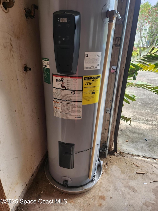 utility room with electric water heater