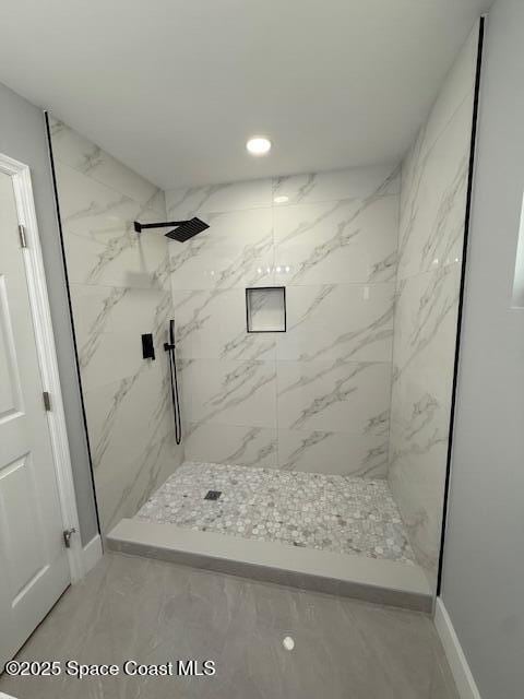 full bathroom with recessed lighting, baseboards, a marble finish shower, and marble finish floor