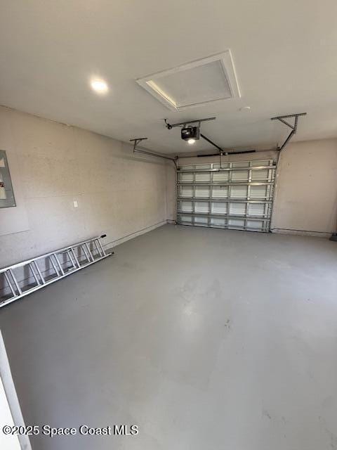 garage featuring a garage door opener