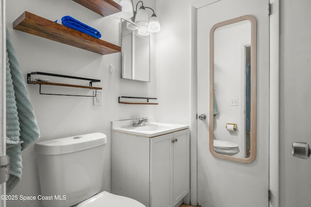 621 Plymouth St, Melbourne, FL 32935 - bathroom with vanity and toilet