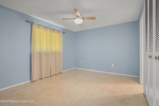 621 Plymouth St, Melbourne, FL 32935 - unfurnished bedroom with a closet, baseboards, speckled floor, and ceiling fan