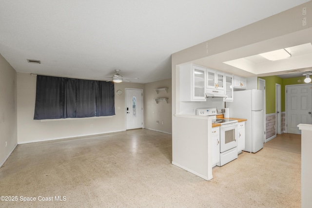 621 Plymouth St, Melbourne, FL 32935 - kitchen featuring white cabinets, ceiling fan, white appliances, under cabinet range hood, and visible vents