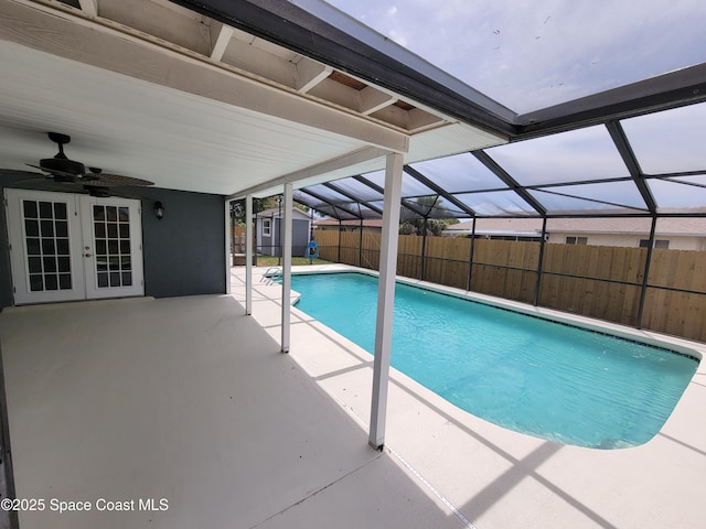 2175 Dumas St, Merritt Island, FL 32952 - view of pool featuring a storage shed, a patio, an outbuilding, a fenced backyard, and a lanai