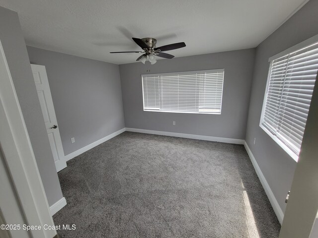 2175 Dumas St, Merritt Island, FL 32952 - unfurnished room with carpet floors, ceiling fan, and baseboards