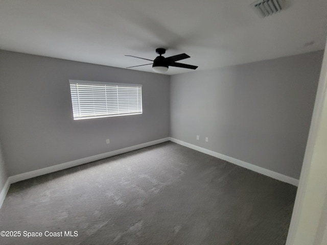 2175 Dumas St, Merritt Island, FL 32952 - empty room featuring ceiling fan, baseboards, and dark carpet