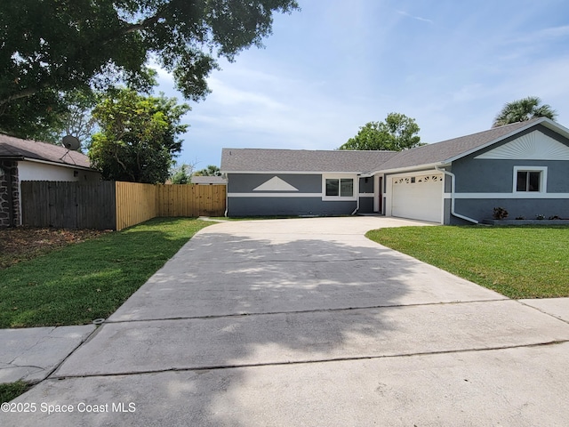 2175 Dumas St, Merritt Island, FL 32952 - view of front of home with driveway, a garage, and stucco siding
