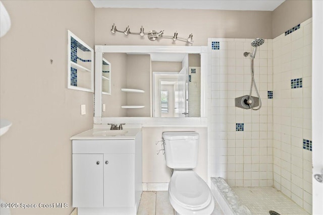 full bathroom with vanity, toilet, and a stall shower