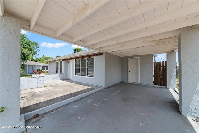 view of patio featuring a carport