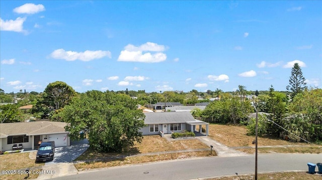 view of front of home featuring an attached garage and driveway