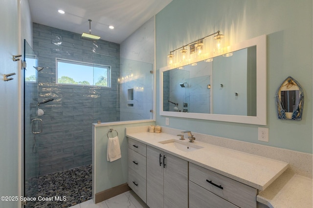 full bath with recessed lighting, a shower stall, and vanity