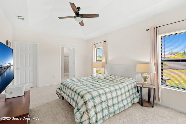 4637 Broomsedge Cir, West Melbourne, FL 32904 - bedroom featuring carpet, baseboards, a ceiling fan, and connected bathroom