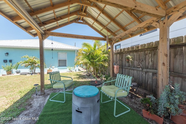 view of patio / terrace featuring fence and a gazebo