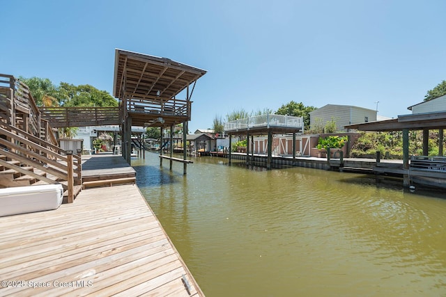 view of dock with a water view