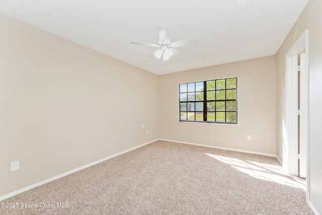 unfurnished bedroom with carpet floors, baseboards, and a ceiling fan