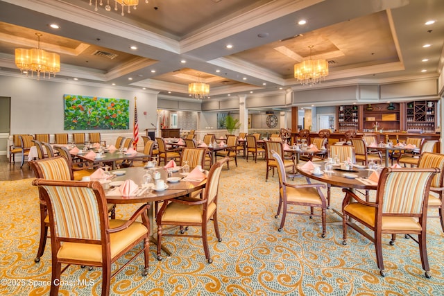 dining area with decorative columns, crown molding, a chandelier, coffered ceiling, and recessed lighting