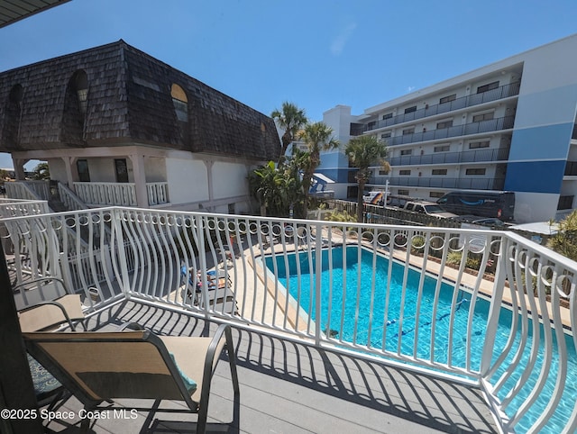community pool with fence