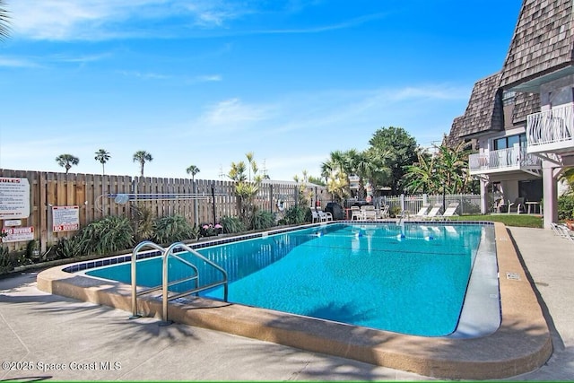 pool featuring fence