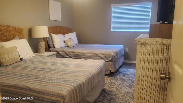 5350 Ocean Beach Blvd Unit 207, Cocoa Beach, FL 32931 - bedroom with wood finished floors and baseboards
