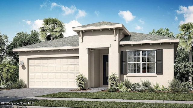 prairie-style house with an attached garage, roof with shingles, stucco siding, and driveway