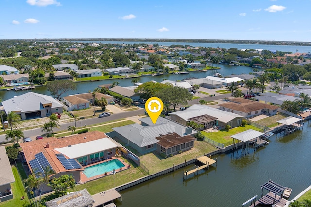451 Bridgetown Ct, Satellite Beach, FL 32937 - aerial view of residential area featuring a large body of water