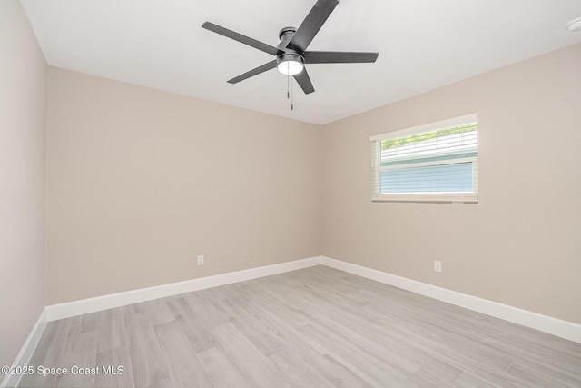 451 Bridgetown Ct, Satellite Beach, FL 32937 - unfurnished room with light wood-style flooring, a ceiling fan, and baseboards
