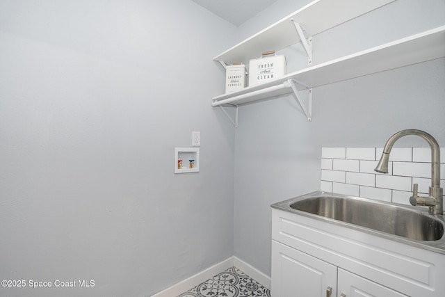451 Bridgetown Ct, Satellite Beach, FL 32937 - laundry area with washer hookup and baseboards