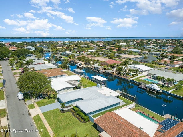 451 Bridgetown Ct, Satellite Beach, FL 32937 - aerial perspective of suburban area with a large body of water
