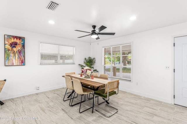 dining space featuring a ceiling fan, baseboards, visible vents, and recessed lighting