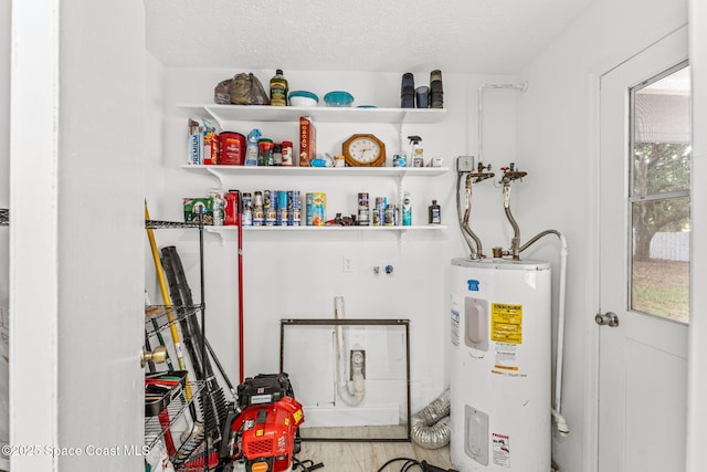 utility room featuring water heater