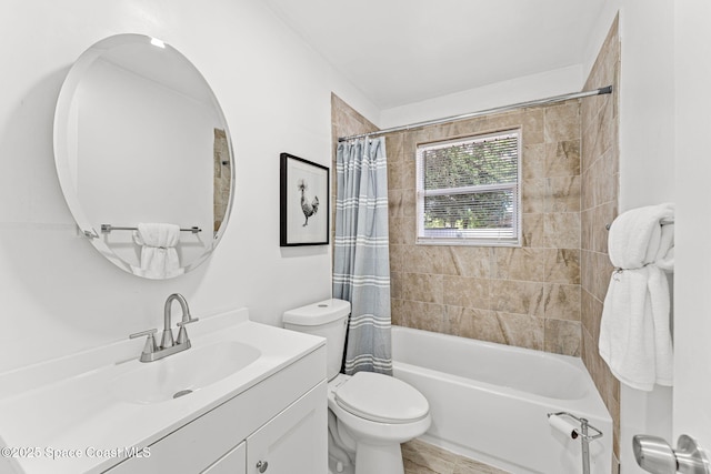 bathroom featuring vanity, toilet, and shower / tub combo