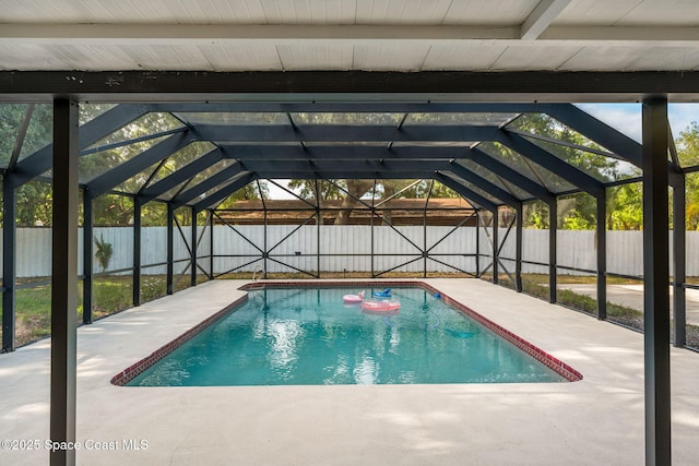 view of pool featuring a patio, a fenced backyard, a lanai, and a fenced in pool