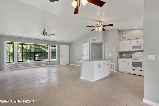 kitchen with white appliances, ceiling fan, open floor plan, and visible vents