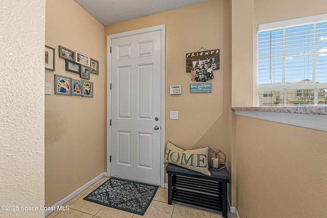 2990 S Fiske Blvd Unit C4, Rockledge, FL 32955 - entryway with tile patterned floors and baseboards