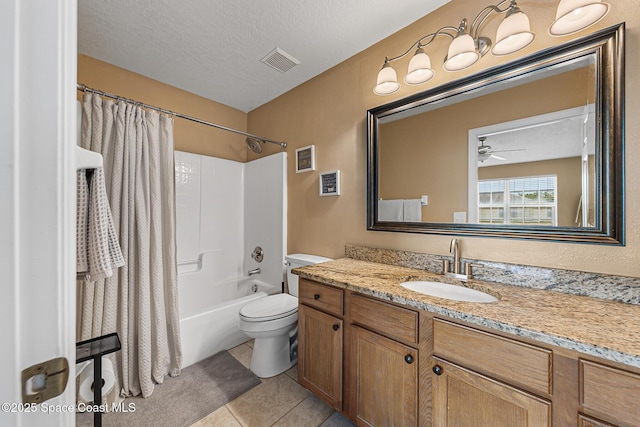 2990 S Fiske Blvd Unit C4, Rockledge, FL 32955 - full bath with a textured ceiling, toilet, tile patterned floors, vanity, and shower / bath combo