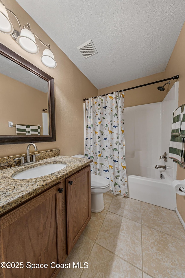 2990 S Fiske Blvd Unit C4, Rockledge, FL 32955 - full bathroom with toilet, shower / bathtub combination with curtain, vanity, a textured ceiling, and tile patterned floors