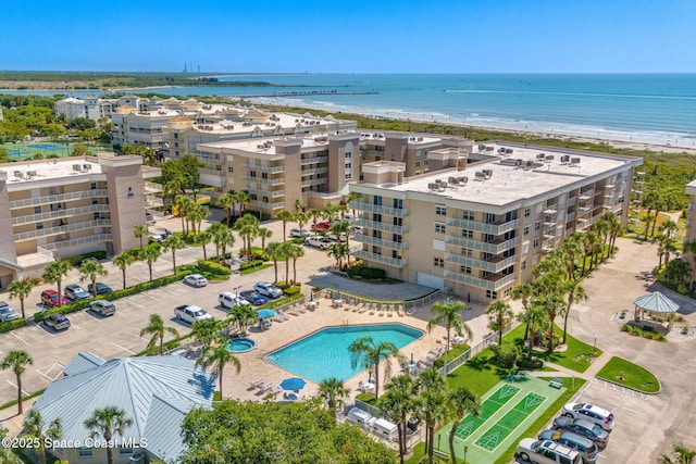 602 Shorewood Dr Unit A201, Cape Canaveral, FL 32920 - bird's eye view of a nearby body of water, apartment complex / building, and a pool