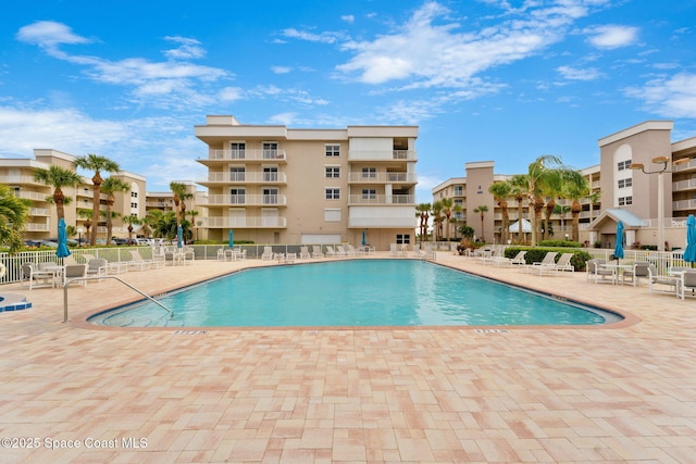 602 Shorewood Dr Unit A201, Cape Canaveral, FL 32920 - community pool with fence and a patio